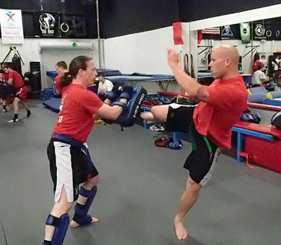 Kendall Giles holding Muay Thai pads Kendall Giles holding Muay Thai pads